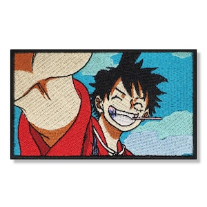 Puede incluir: Un parche bordado rojo y blanco con un personaje de dibujos animados con cabello negro, una camisa roja y una gran sonrisa. El personaje sostiene una pajita en la boca y está sobre un fondo de cielo azul.