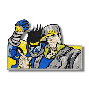 May include: Embroidered patch featuring two anime characters, one with black hair and a blue and yellow outfit, the other with brown hair and a gray jacket. The characters are standing side-by-side and the patch has a gray border.