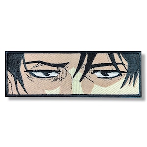 Broderad lapp med anime och mangaögon