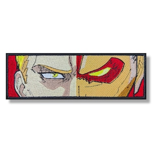 May include: Embroidered patch depicting a close-up of a man's face, one side showing a normal expression and the other side showing a fierce expression with a red, angry eye.
