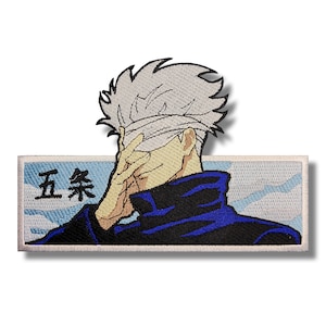 May include: Embroidered patch featuring a white-haired character with a blindfold, covering their face with their hand. The character is wearing a blue jacket and is set against a blue sky with white clouds. The text "五条" is visible in the background.