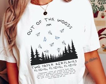 Chemise Out Of The Woods, vols d'avions en papier, chemise Taylor, Taylor Merch, chemise album 1.9.8.9, album LVR, tournée Eras, Cowboy Like Me