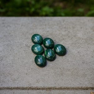 Natural Malachite Oval Cabochon: AAA+ Quality Gemstone