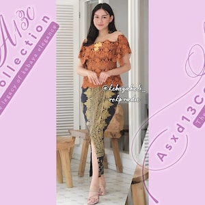 Kebaya dress | Complete set | for weddings or formal event | Made of brocade and batik fabric | Short sleeve | Glamourus kebaya