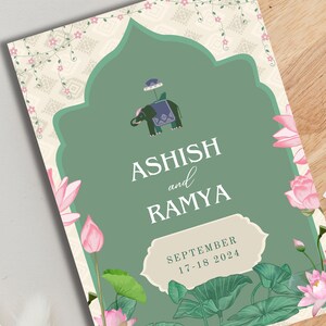 May include: A green and cream wedding invitation with floral accents. The invitation features an illustration of an elephant with a canopy and the text "Ashish and Ramya" and "September 17-18 2024".