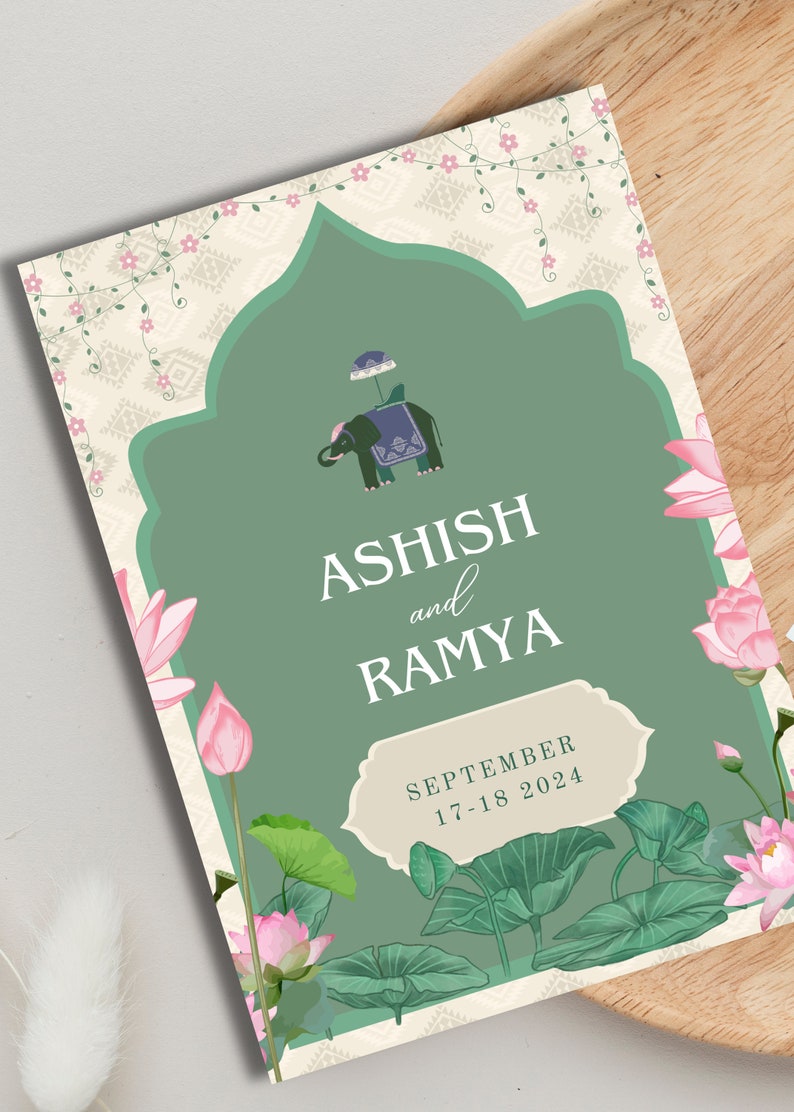 May include: A green and cream wedding invitation with floral accents. The invitation features an illustration of an elephant with a canopy and the text "Ashish and Ramya" and "September 17-18 2024".