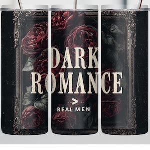 May include: A set of three stainless steel tumblers with a dark floral design and the words "DARK ROMANCE" in white. The tumblers feature a black background with red roses and the text "REAL MEN". Each tumbler has a silver straw.