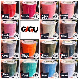 May include: A collection of 15 spools of waxed cotton cord in various colors, including red, fuchsia, neon pink, powder pink, barbie pink, cream, sand, gray, neon orange, olive green, dark green, pine green, teal, blue, and white. Each spool is labeled with a number from 1 to 15. The spools are arranged in a grid pattern on a white background. The text "GAGU CRAFTS" is displayed in the center of the image.