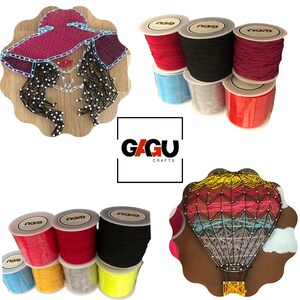 May include: Assortment of colorful string spools for string art projects. The spools are labeled "GAGU CRAFTS". The image also shows two string art projects: a woman with a hat and a hot air balloon.