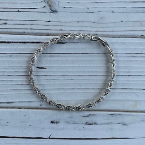 Vintage Avon silver tone bracelet with clear rhinestone