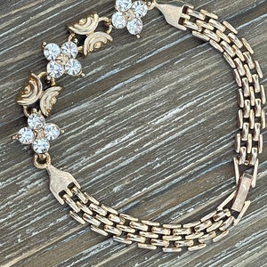 Vintage Gold tone bracelet with Clear Rhinestones Flowers