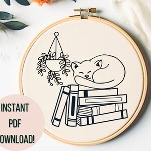 May include: A black and white line drawing of a cat sleeping on a stack of books. A hanging plant with leaves is in the background. The image is on a white background.