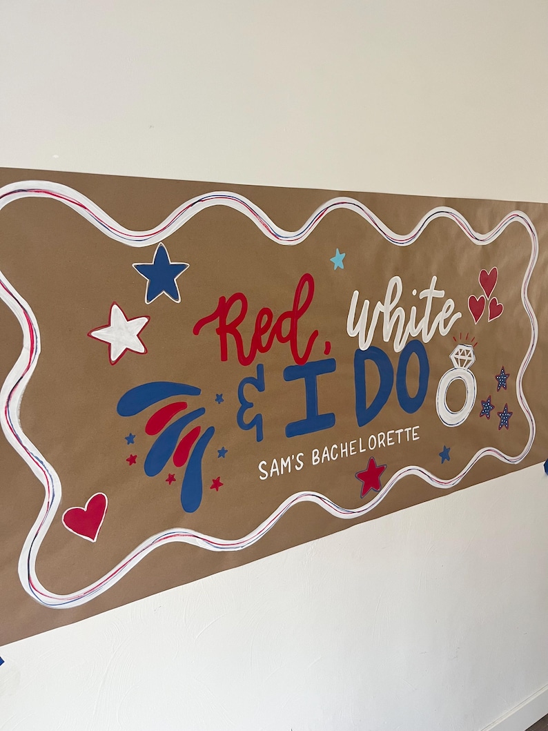 May include: A rectangular brown paper banner featuring the text Red, white & I DO and SAM'S BACHELORETTE in red and blue. The design includes a white diamond ring illustration, red and blue hearts, and various stars on a wavy white border.