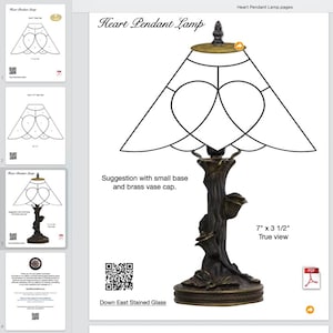 May include: A heart-shaped stained glass lamp design with a bronze base and brass cap. The text "Heart Pendant Lamp" is at the top. The dimensions are 17.78 cm x 8.89 cm. The design is from Down East Stained Glass.