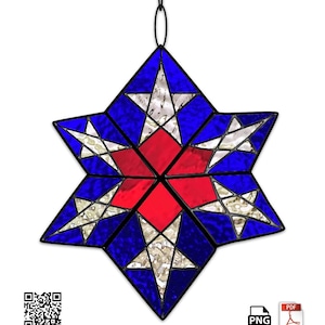 May include: A stained glass star spinner with a six-pointed star design. The star features a vibrant color scheme of blue, red, and white. The text "Star Spinner" is at the top, and "Down East Stained Glass" is at the bottom.