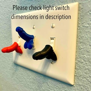 May include: Three light switch covers with different colored 3D printed designs. The covers are red, blue, and black. The text "Please check light switch dimensions in description" is above the switch covers.