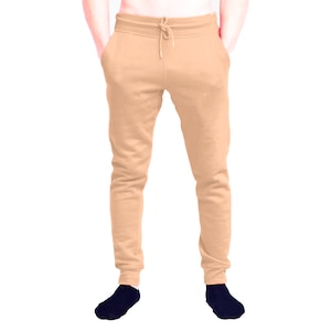 May include: A pair of light brown sweatpants with a drawstring waist.