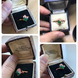 May include: A green jade ring with a rose gold band and small diamonds set in the band. The ring is in a small, brown velvet box with a white label that reads "J.W. BAILEY Watchmaker & Jeweller 522 COVENTRY RD BIRMINGHAM."