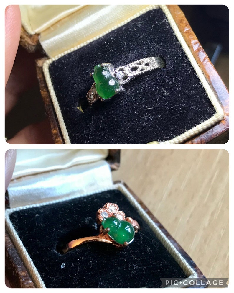 May include: Two jade rings in their boxes. The top ring is silver with a green jade stone and white diamonds. The bottom ring is gold with a green jade stone and white diamonds.