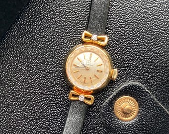 Reloj vintage Omega de oro macizo de 18 quilates con diamantes