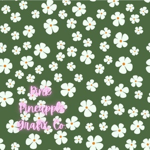 May include: A seamless pattern featuring white daisy-like flowers with orange centers scattered on a dark green background. The text "Pink Pineapple Grafix Co." is written in pink cursive font.