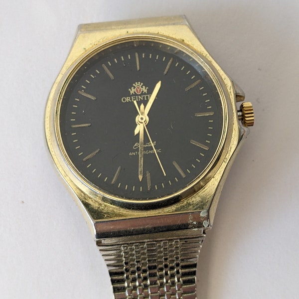 Reloj Oreintex vintage con la pulsera que no funciona para repuestos y reparaciones