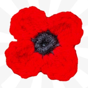 May include: A red crocheted poppy flower with a black centre. The flower is made of yarn and has a textured surface.