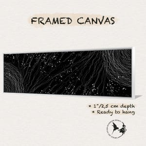 May include: A framed canvas print with a black and white abstract design. The design features a network of white lines on a black background. The canvas is 1 inch deep and ready to hang.