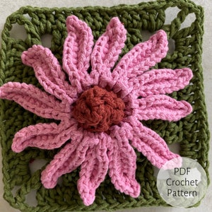 May include: A crochet flower motif with pink petals and a brown center, set against a green crochet square background. The image includes the text "PDF Crochet Pattern".
