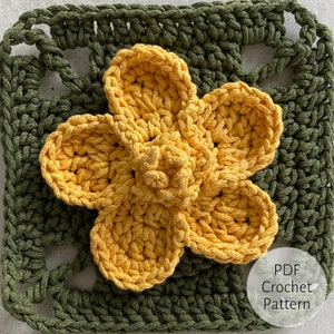 May include: A crochet flower motif in yellow with a green crochet square background. The text "PDF Crochet Pattern" is visible in the bottom right corner of the image.
