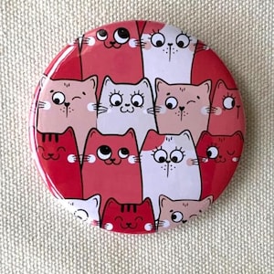 Cat Badge: Lots of Cats with Headphones (58mm)