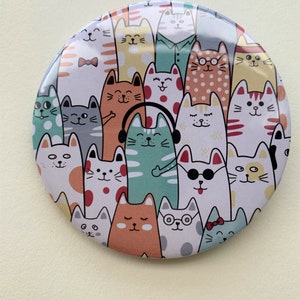 Insigne de chat. Badge Lots de chats, chat avec casque