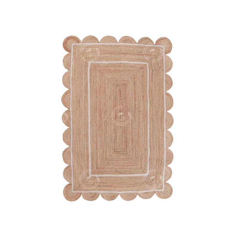 May include: A natural fiber rug with a scalloped edge and a white border. The rug is made of jute and has a natural, earthy color.
