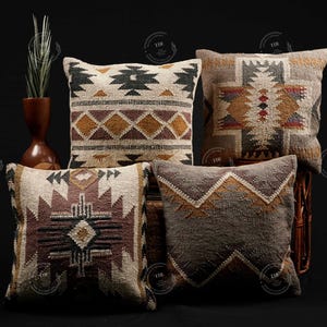 May include: Four decorative throw pillows with geometric patterns in shades of brown, beige, and grey. The pillows are arranged on a wicker chair with a brown fabric background.