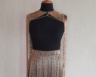 Macramé-festivaloutfit: gouden tube rave-kostuum