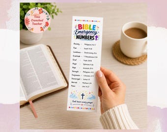 May include: A white bookmark with the text "BIBLE EMERGENCY NUMBERS" and a list of Bible verses for various emotions. The bookmark is held by a person. A cup of coffee and an open book are in the background.