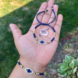 Evil eye string bracelet