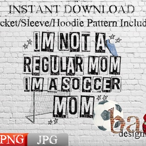 May include: A white brick wall with black text that reads "IM NOT A REGULAR MOM IMA SOCCER MOM". There is a soccer ball and a soccer goal drawn on the wall. The text "bas designs" is written in red and black at the bottom of the image.