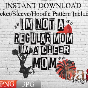 May include: A white brick wall with black text that reads "I'm not a regular mom I'm a cheer mom" with a black silhouette of a cheerleader holding pom-poms and a red megaphone. The text is in a distressed font and there are red and black pom-poms on the right side of the image. The text "designs" and the year "2023" are in the bottom right corner of the image.