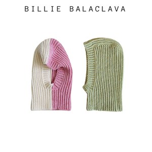 May include: Two knitted balaclavas, one in white and pink, the other in green.  Billie Balaclava is written at the top of the image.