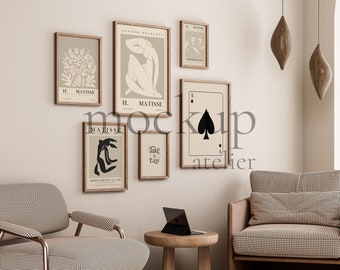 May include: A living room interior with two chairs, a side table, and a wall gallery of framed art prints. The prints feature abstract line art, a playing card, and the text "Take it Easy".