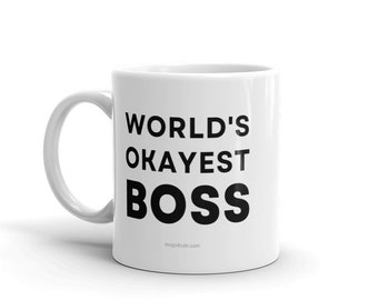 May include: White ceramic coffee mug with black text that reads "WORLD'S OKAYEST BOSS" and the website "mugs4sale.com" at the bottom.