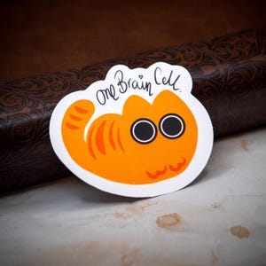 Adesivo de vinil One Brain Cell - Gato Laranja