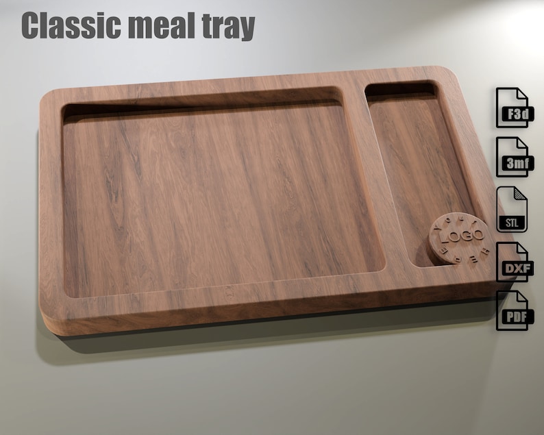 Puede incluir: Una bandeja de comida de madera con una secci&oacute;n principal rectangular y un compartimento m&aacute;s peque&ntilde;o, rectangular. La bandeja tiene un acabado de veta de madera oscura y una hendidura circular con la palabra "LOGO". El texto "Classic meal tray" est&aacute; en la parte superior.