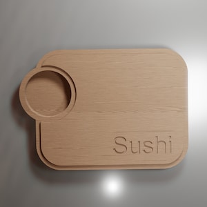 May include: A wooden serving tray with a round cutout and the word "Sushi" carved into the surface.