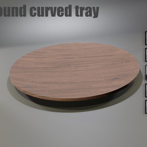 May include: A round, curved tray with a wood grain finish. The tray is brown and has a slightly raised edge. The text "Round curved tray" is at the top. File type icons are on the right.
