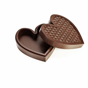May include: A heart-shaped wooden box with a hinged lid. The lid is slightly ajar, revealing a woven pattern on the inside. The box is made of dark brown wood and sits against a white background.