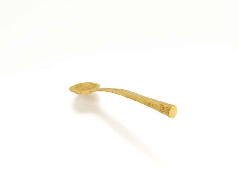 May include: A wooden spoon with a natural finish. The spoon has a rounded bowl and a long, slender handle.