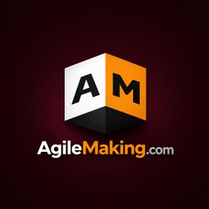 May include: A logo featuring a 3D cube with the letters "A" and "M" in black on white and orange panels. The text "AgileMaking.com" is displayed below the cube in white.