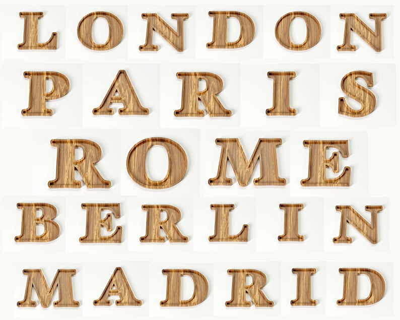 May include: Wooden letters spelling out the names of cities: London, Paris, Rome, Berlin, and Madrid. The letters are a light brown color with a wood grain texture, and are arranged on a white background.